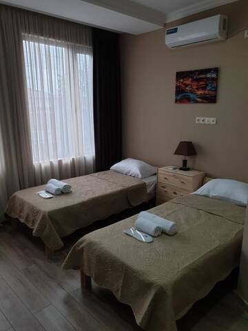 Фото номера Двухместный номер с 2 отдельными кроватями Отель Hotel Zugdidi Time г. Зугдиди 3
